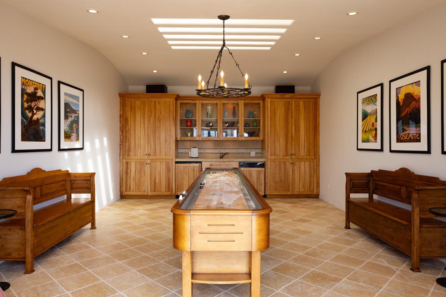 31453 Highway 1 Carmel, CA 93923 - Photo 24 of 58 a living room with furniture and a chandelier