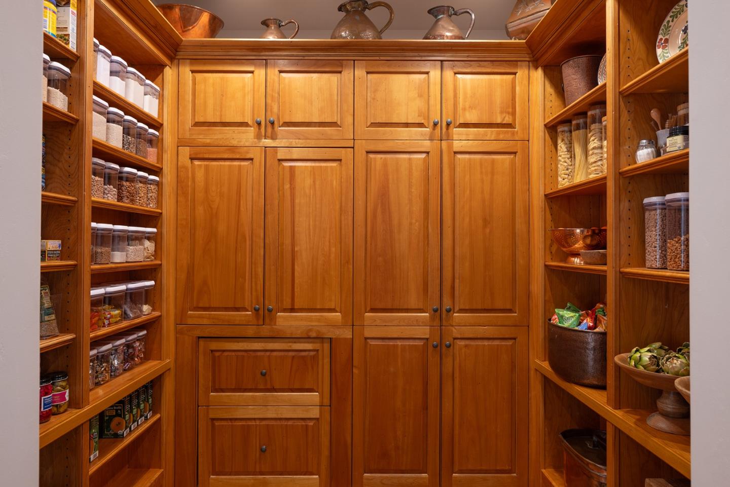 31453 Highway 1 Carmel, CA 93923 - Photo 27 of 58 a view of walk in closet with clothes and shoes