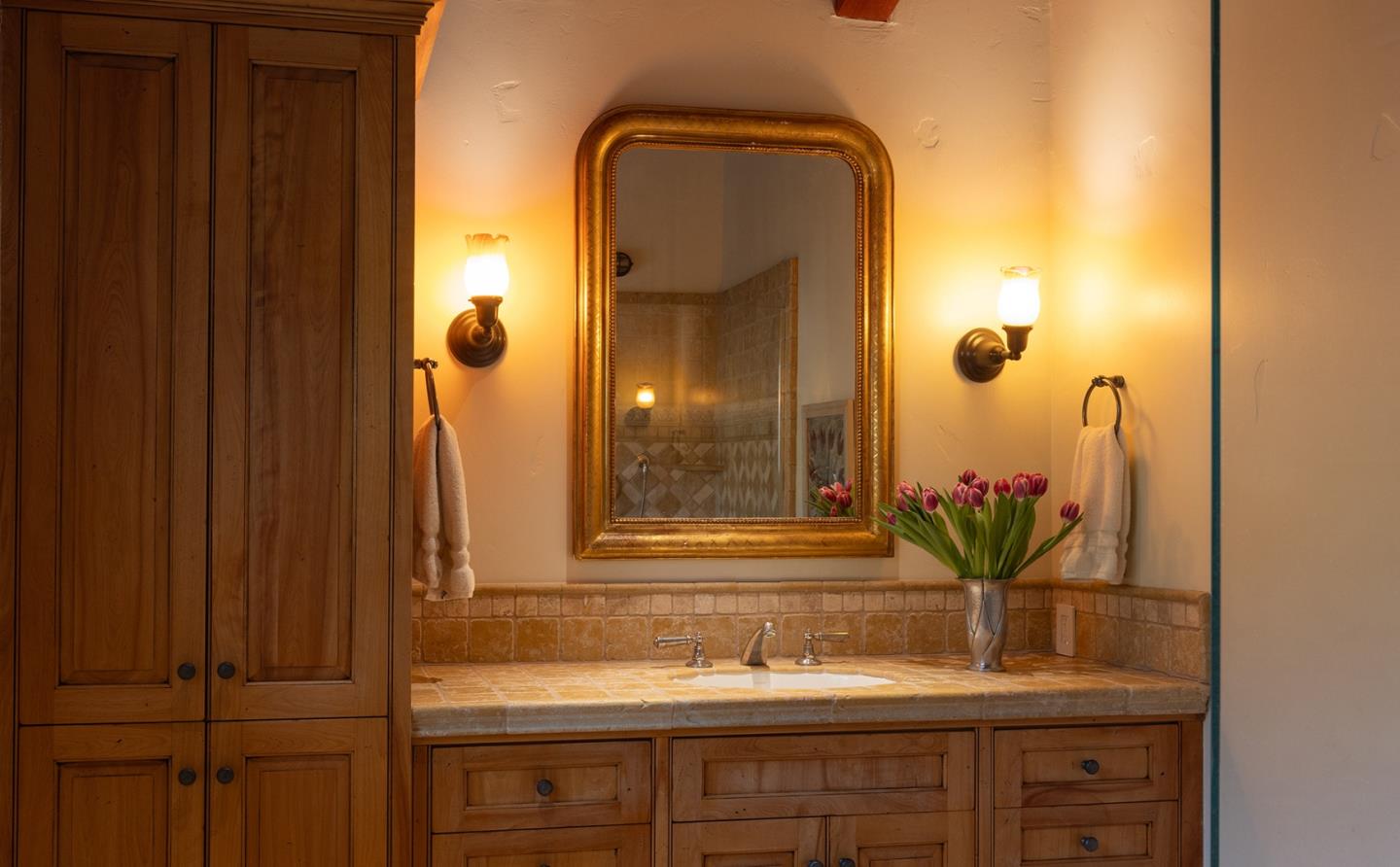 31453 Highway 1 Carmel, CA 93923 - Photo 43 of 58 a bathroom with a sink and a mirror