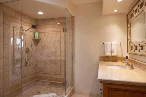 a view of a yard and ocean view