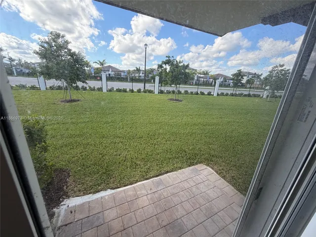a view of a kitchen with a sink