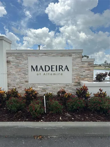 a sign that is on the side of a building