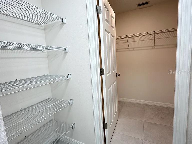 1737 North Lakewood Avenue Ocoee, FL 34761 - Photo 14 of 16 a view of walk in closet