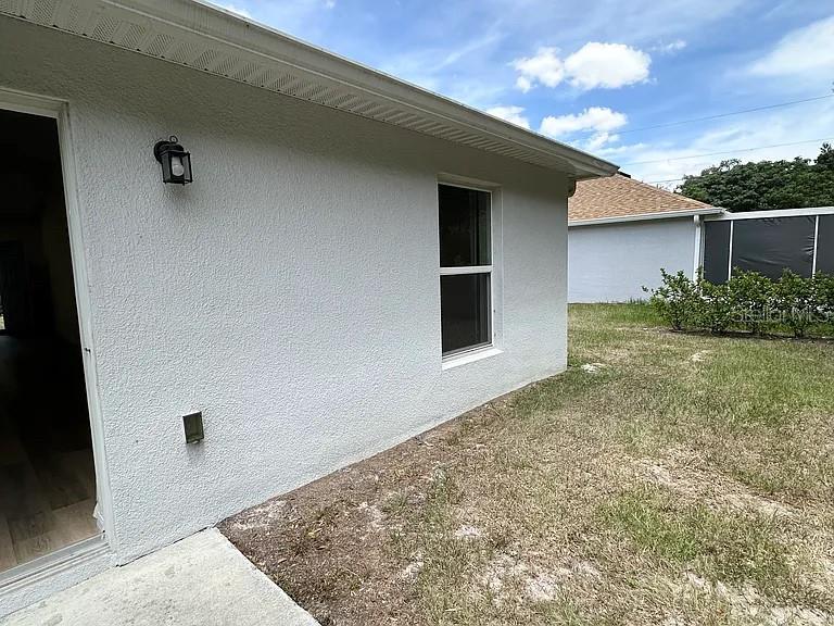 1737 North Lakewood Avenue Ocoee, FL 34761 - Photo 15 of 16 a view of a backyard