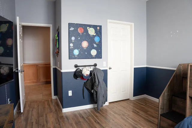 a view of a livingroom with wooden floor