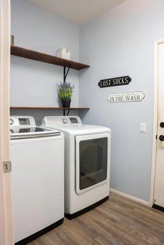a utility room with washer and dryer