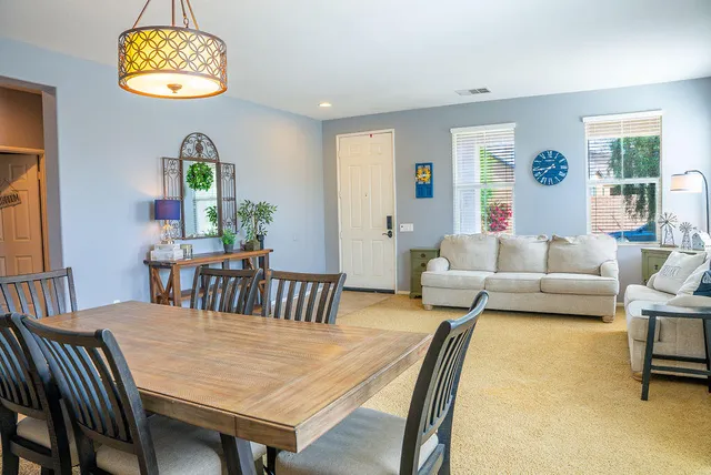 a view of a dining room with furniture