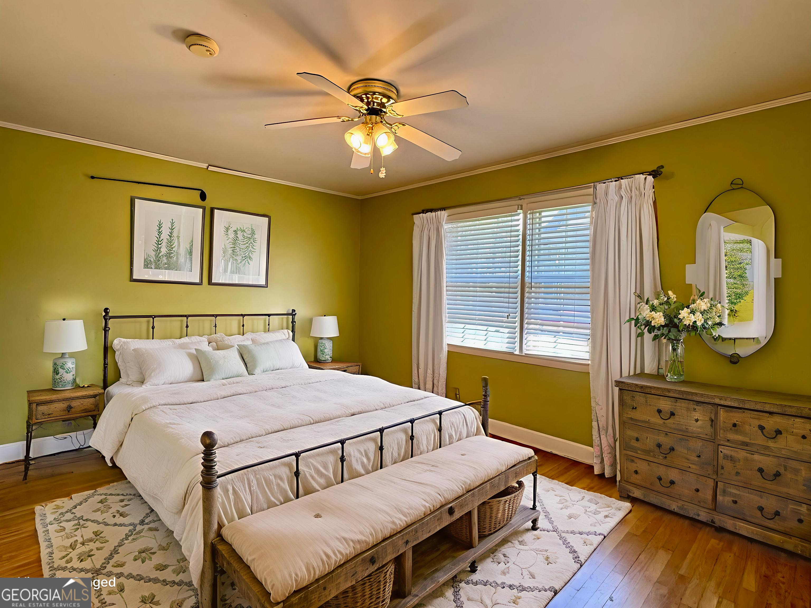 324 North Rhodes Street Union Point, GA 30669 - Photo 51 of 94 a bedroom with a bed and a dresser