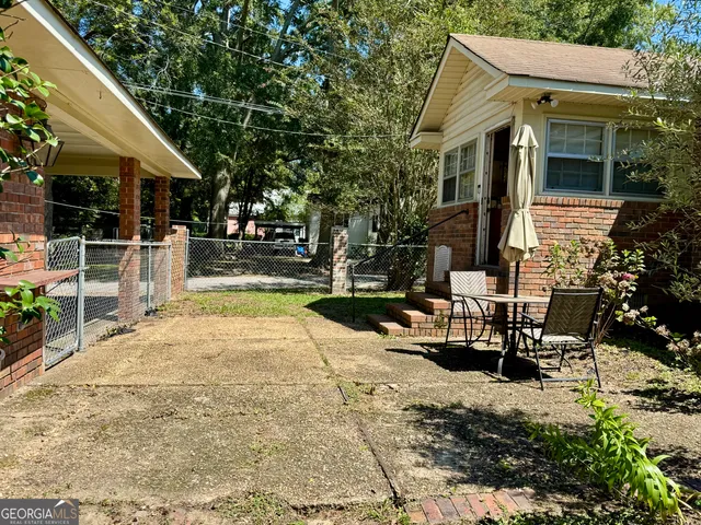 a living room with furniture fireplace and flat screen tv
