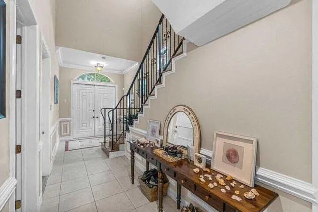 a view of entryway with workspace and window