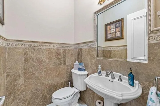 a bathroom with a sink and a toilet