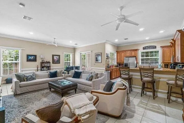 a living room with furniture and a table