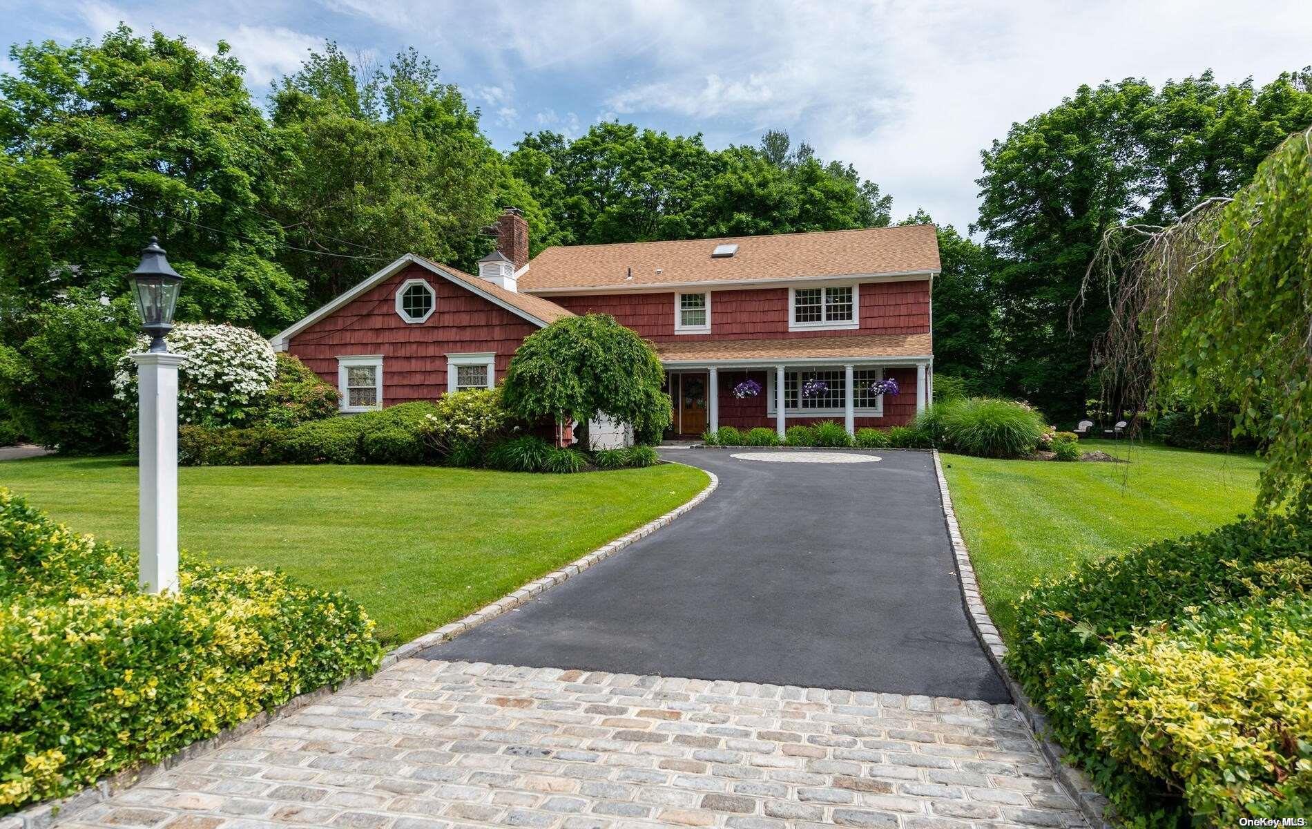 a view of a yard in front of a house