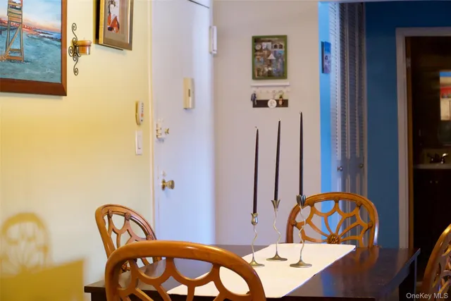 a view of a hallway with chairs