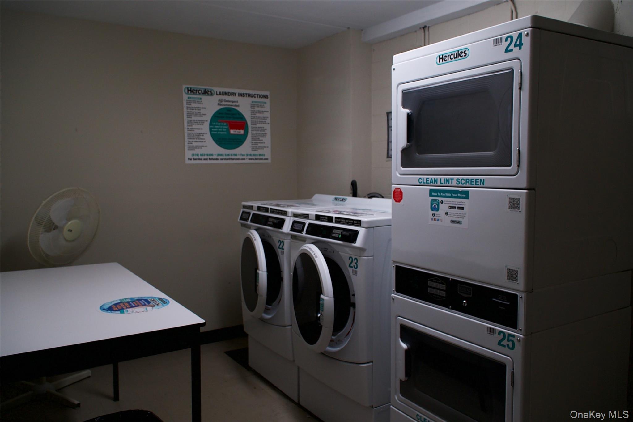 470 Halstead Avenue, Unit 6V Harrison, NY 10528 - Photo 15 of 20 a utility room with dryer and washer