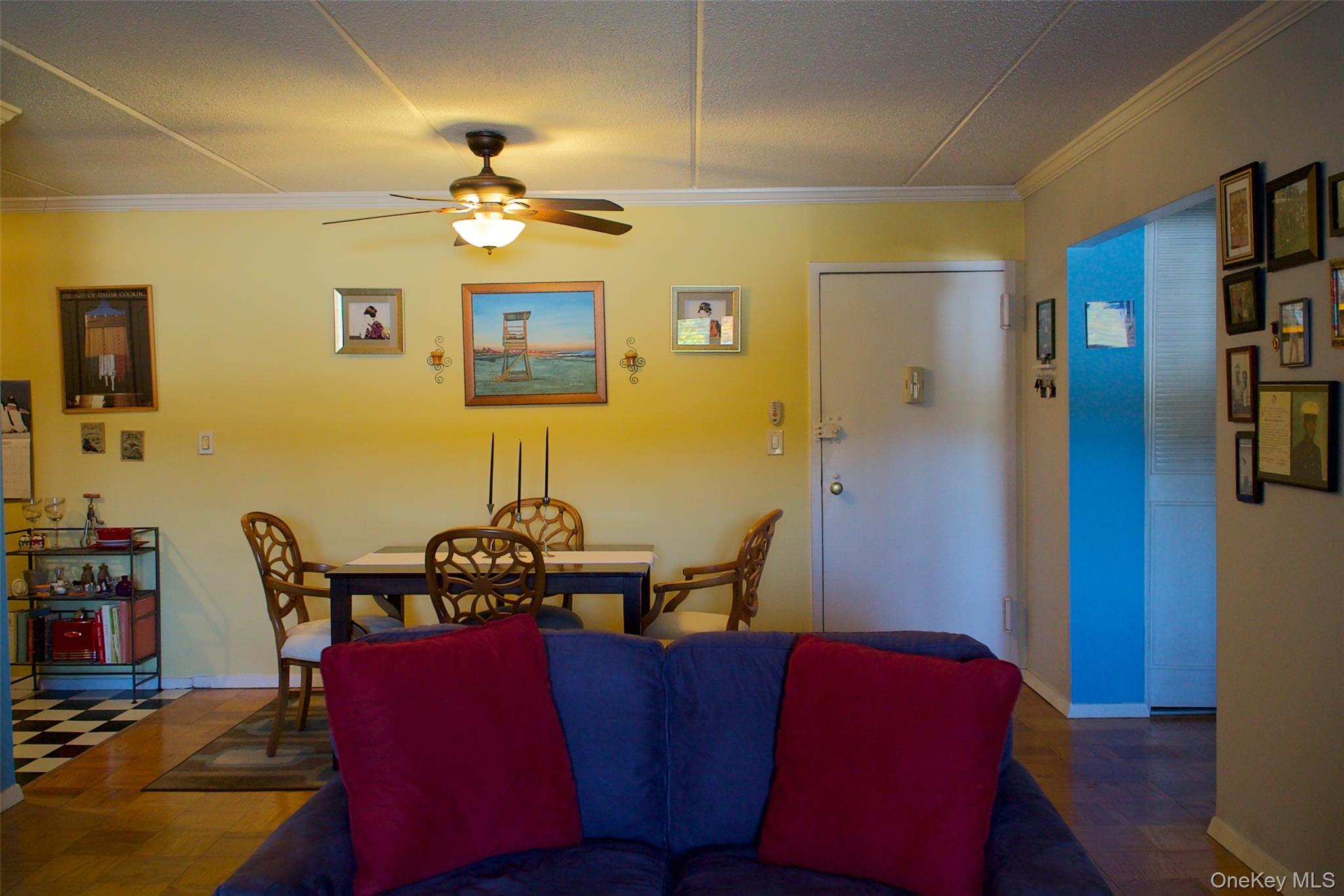 470 Halstead Avenue, Unit 6V Harrison, NY 10528 - Photo 7 of 20 a living room with furniture and a chandelier