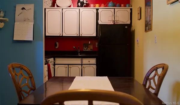 a bed room with a bed and dresser