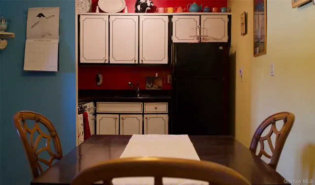 a bed room with a bed and dresser