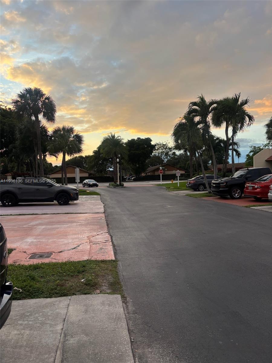 6460 Northwest 192nd Terrace, Unit 6460 Hialeah, FL 33015 - Photo 2 of 42 a view of outdoor space with swimming pool and furniture