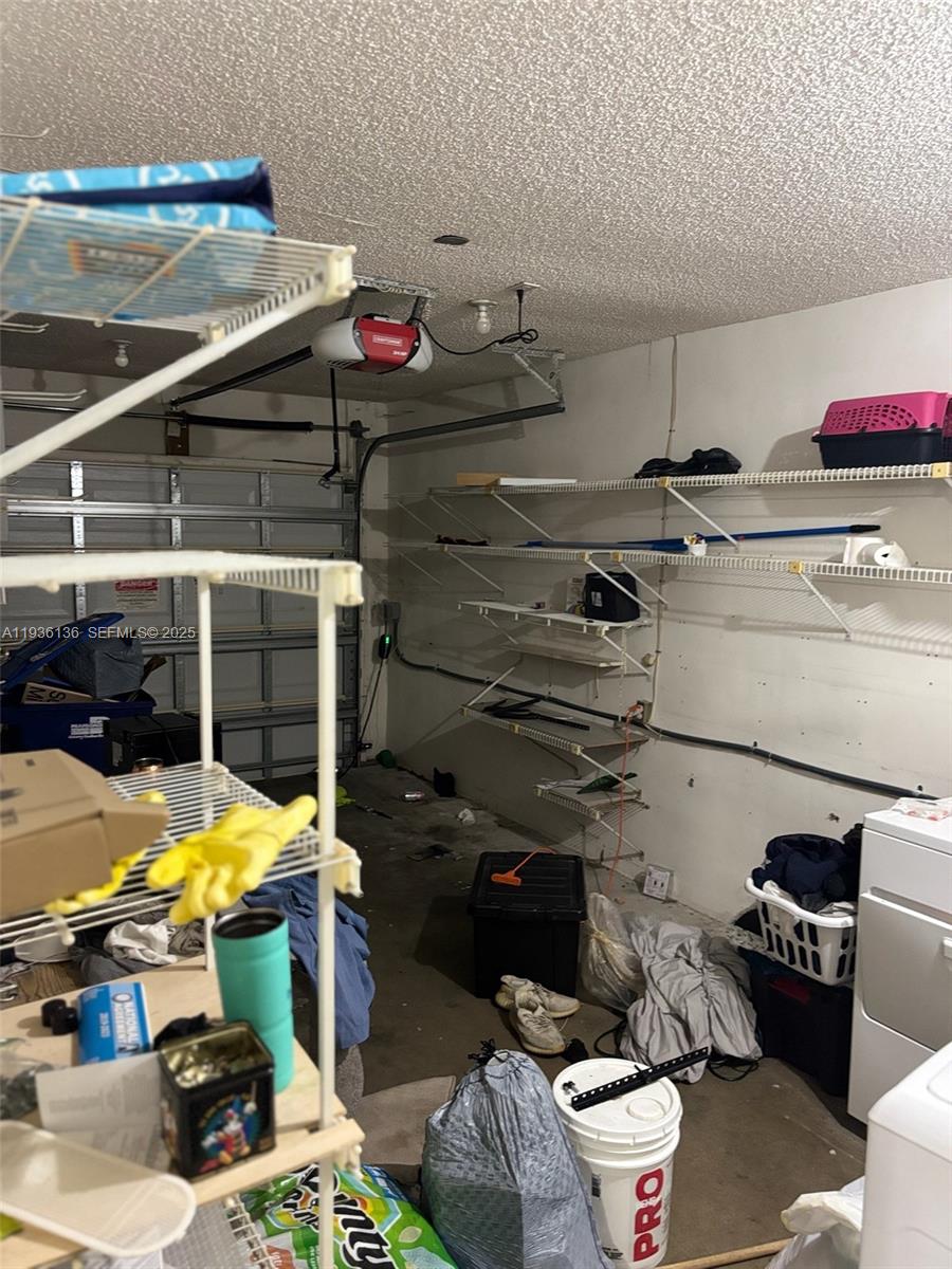 6460 Northwest 192nd Terrace, Unit 6460 Hialeah, FL 33015 - Photo 30 of 42 a room with storage space