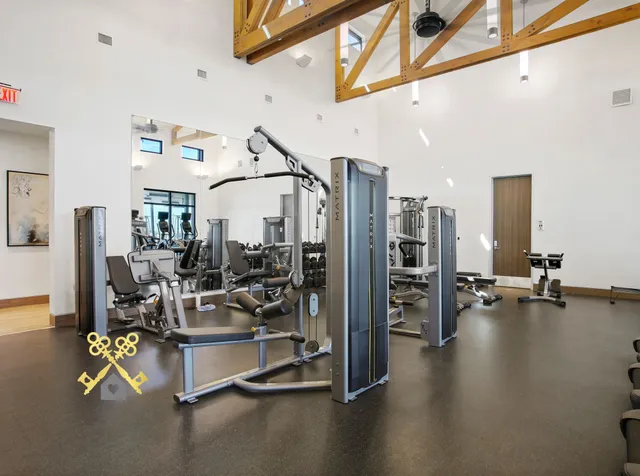 a view of a room with gym equipment