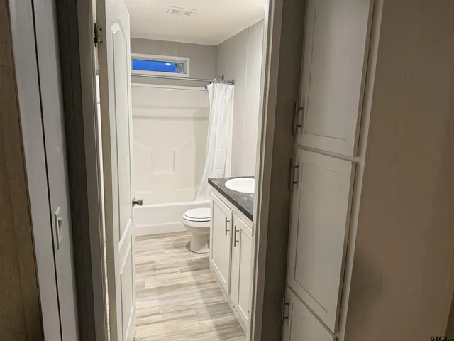 a bathroom with a toilet