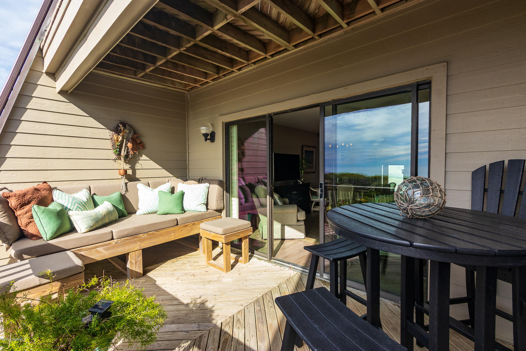 565 Salter Path Road, Unit X3 Pine Knoll Shores, NC 28512 - Photo 13 of 61 Cozy deck off living room