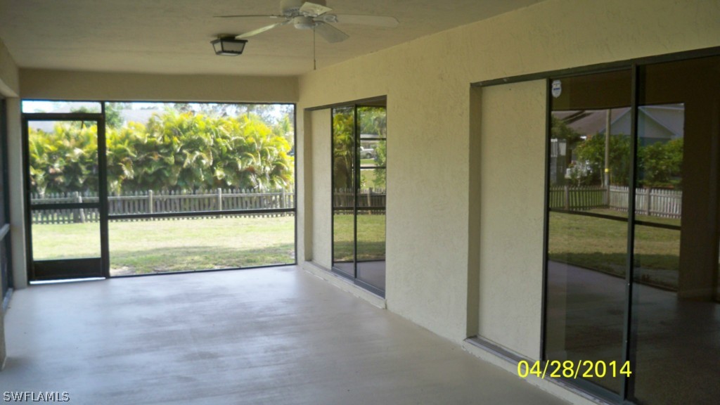 17513 Fuchsia Road Fort Myers, FL 33967 - Photo 3 of 12 a view of an empty room and window