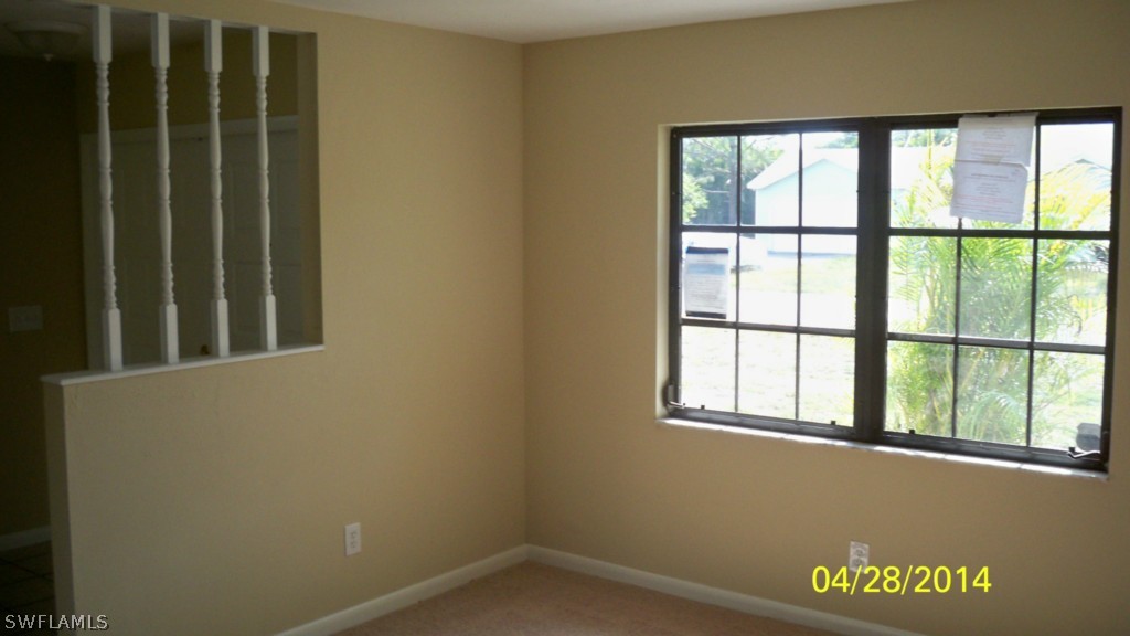 17513 Fuchsia Road Fort Myers, FL 33967 - Photo 5 of 12 a view of a window in an empty room