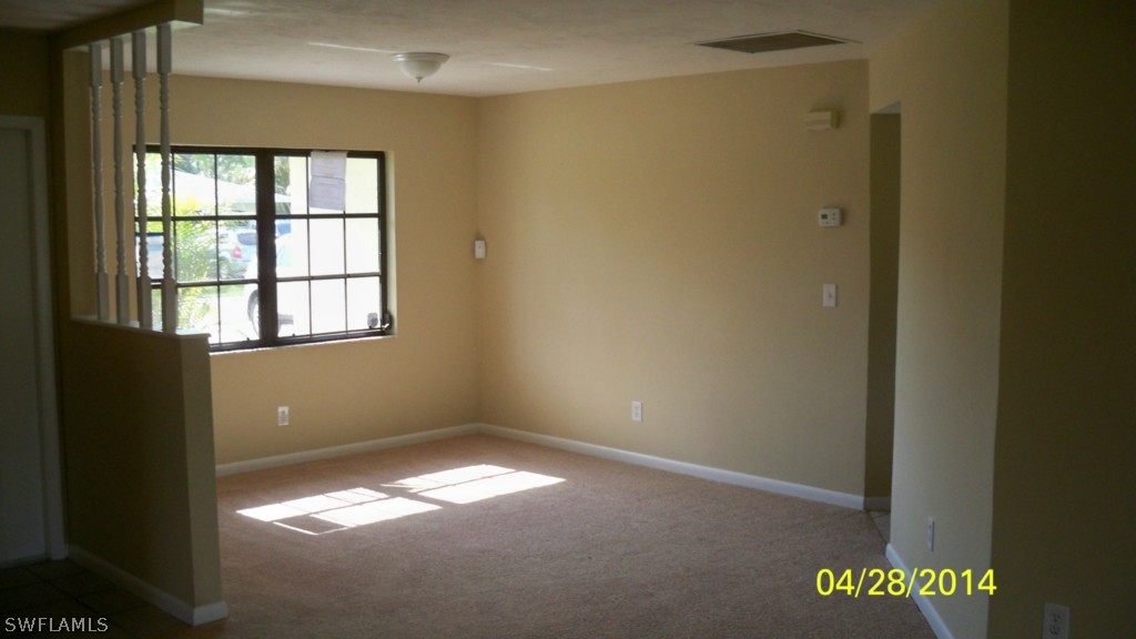 17513 Fuchsia Road Fort Myers, FL 33967 - Photo 7 of 12 a view of empty room with window