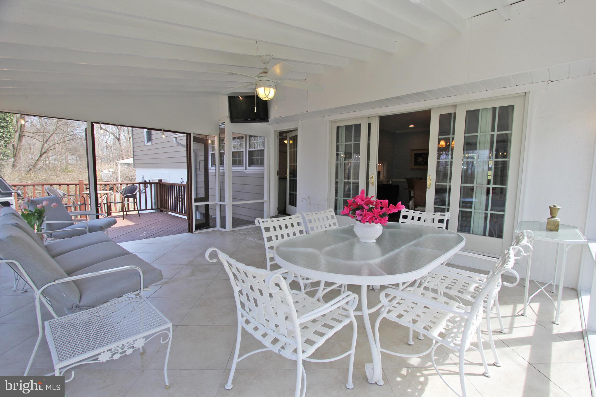 419 Woodcrest Road Wayne, PA 19087 - Photo 11 of 44 covered porched with TV and tile flooring