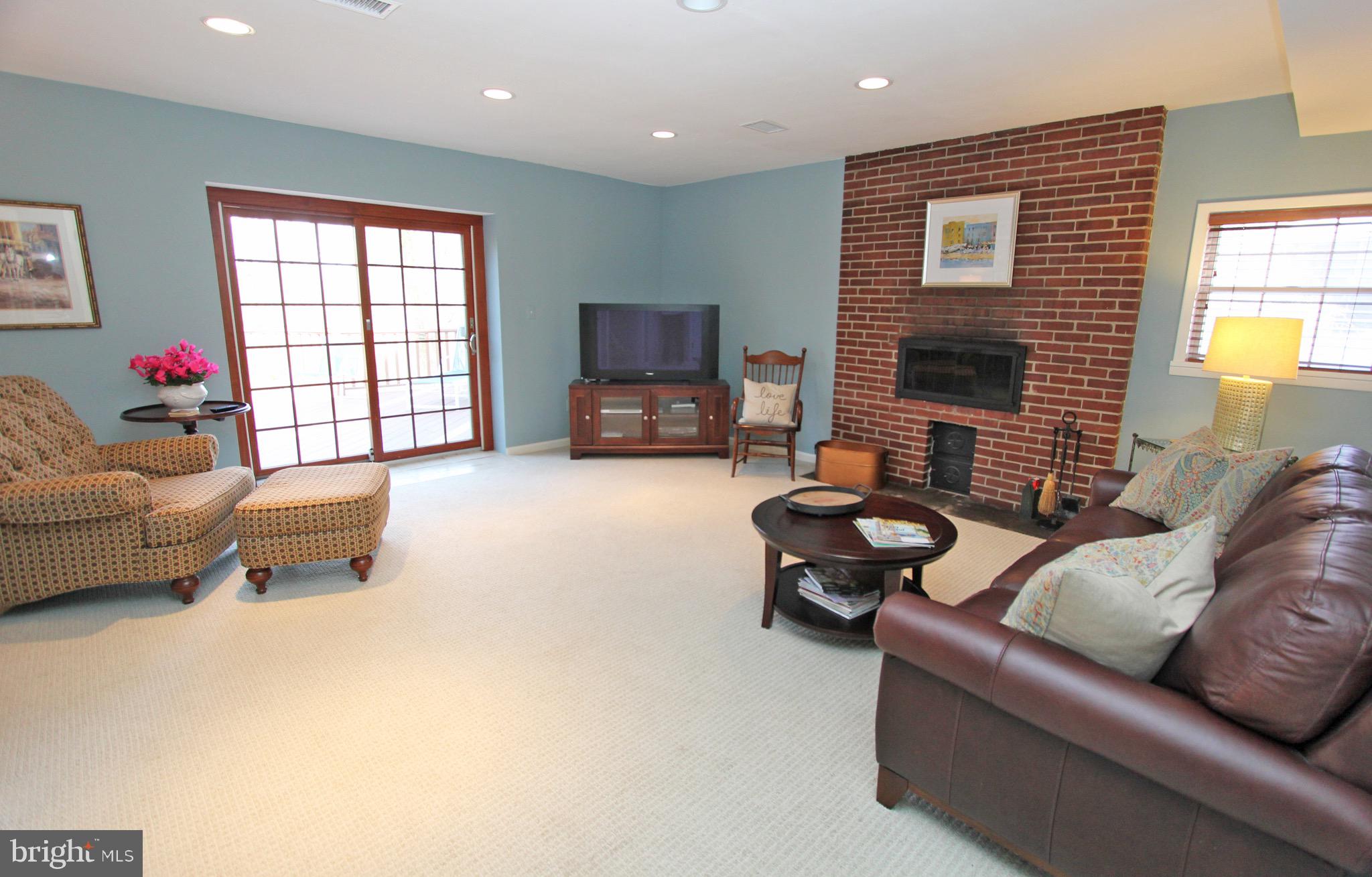 419 Woodcrest Road Wayne, PA 19087 - Photo 15 of 44 Family room with 2nd fireplace & access to garage