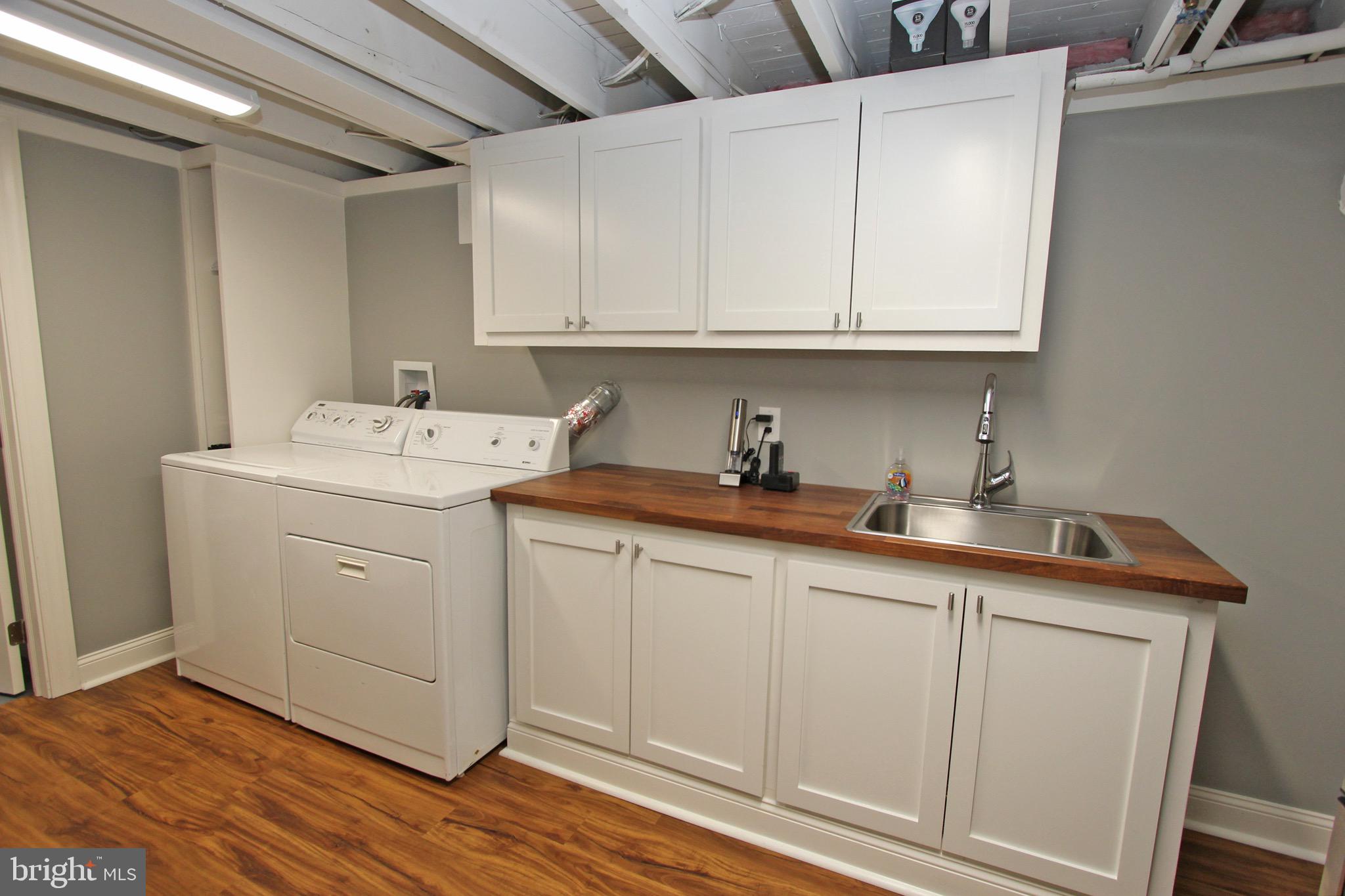 419 Woodcrest Road Wayne, PA 19087 - Photo 24 of 44 dedicated laundry area with sink and cabinetry