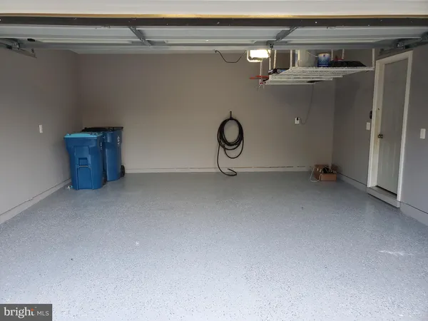 a bathroom with a toilet and a vanity