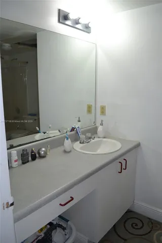 a bathroom with a toilet and a bathtub