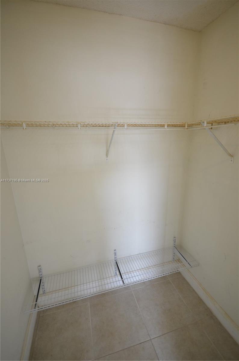 15201 Southwest 80th Street, Unit 207 Miami, FL 33193 - Photo 17 of 23 a view of an empty walk in closet