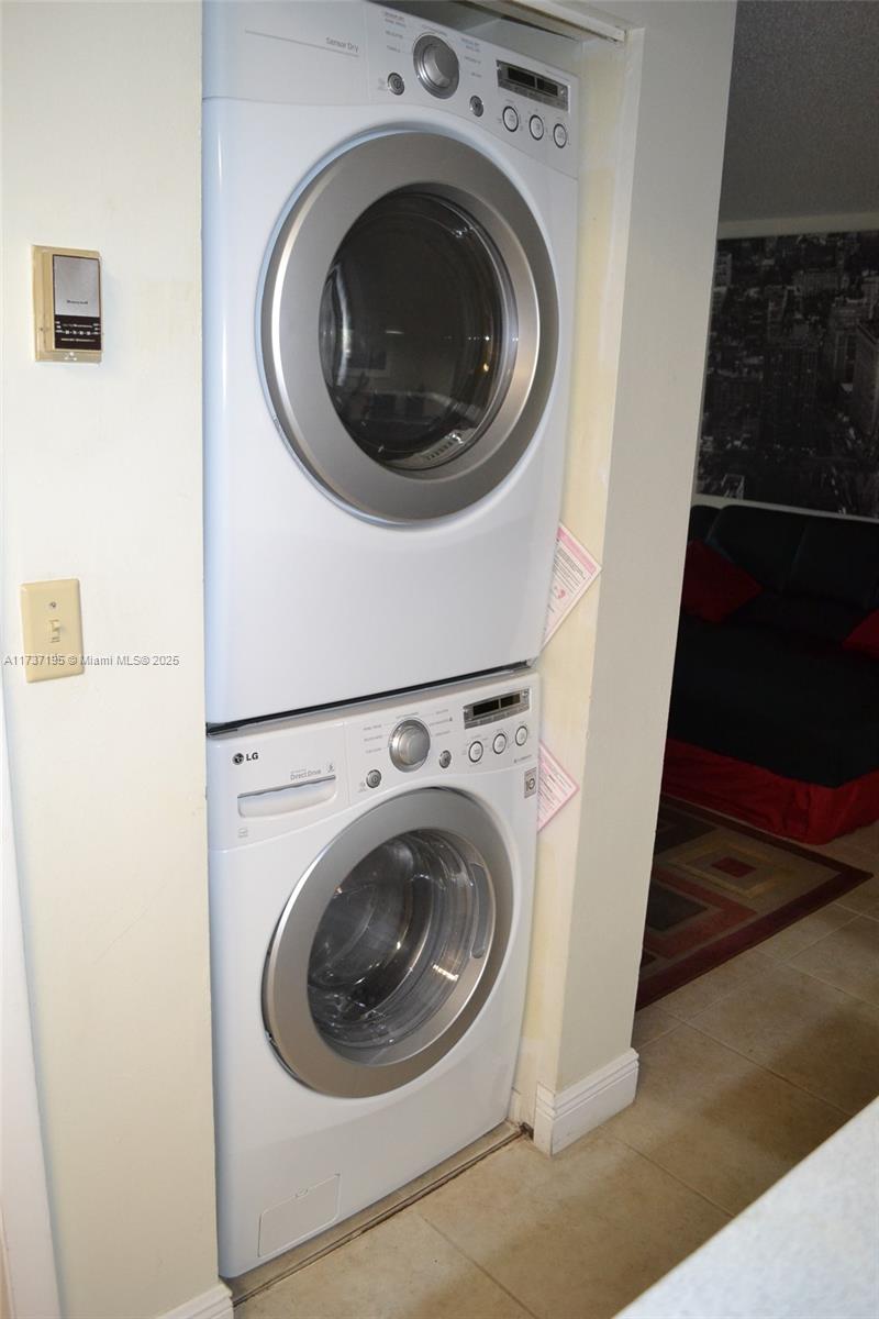 15201 Southwest 80th Street, Unit 207 Miami, FL 33193 - Photo 23 of 23 a utility room with dryer and washer