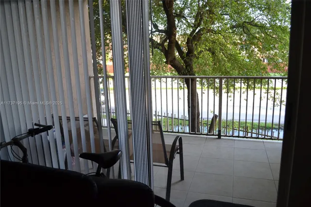 an empty room with white walls