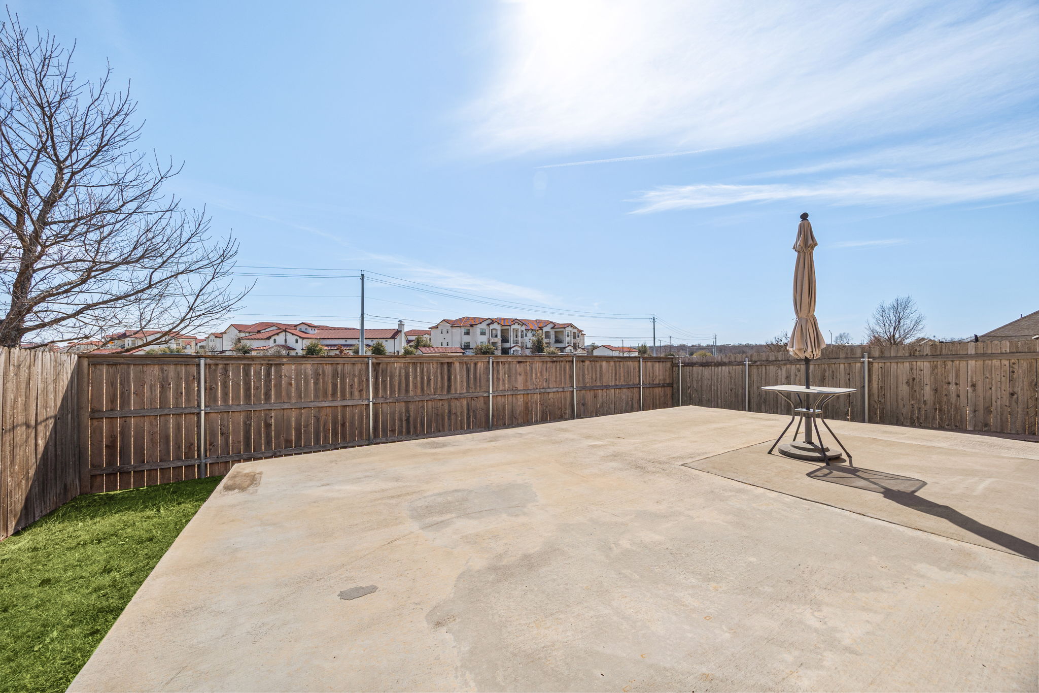14615 Goshawk Drive Pflugerville, TX 78660 - Photo 26 of 29 a view of a terrace with a bench