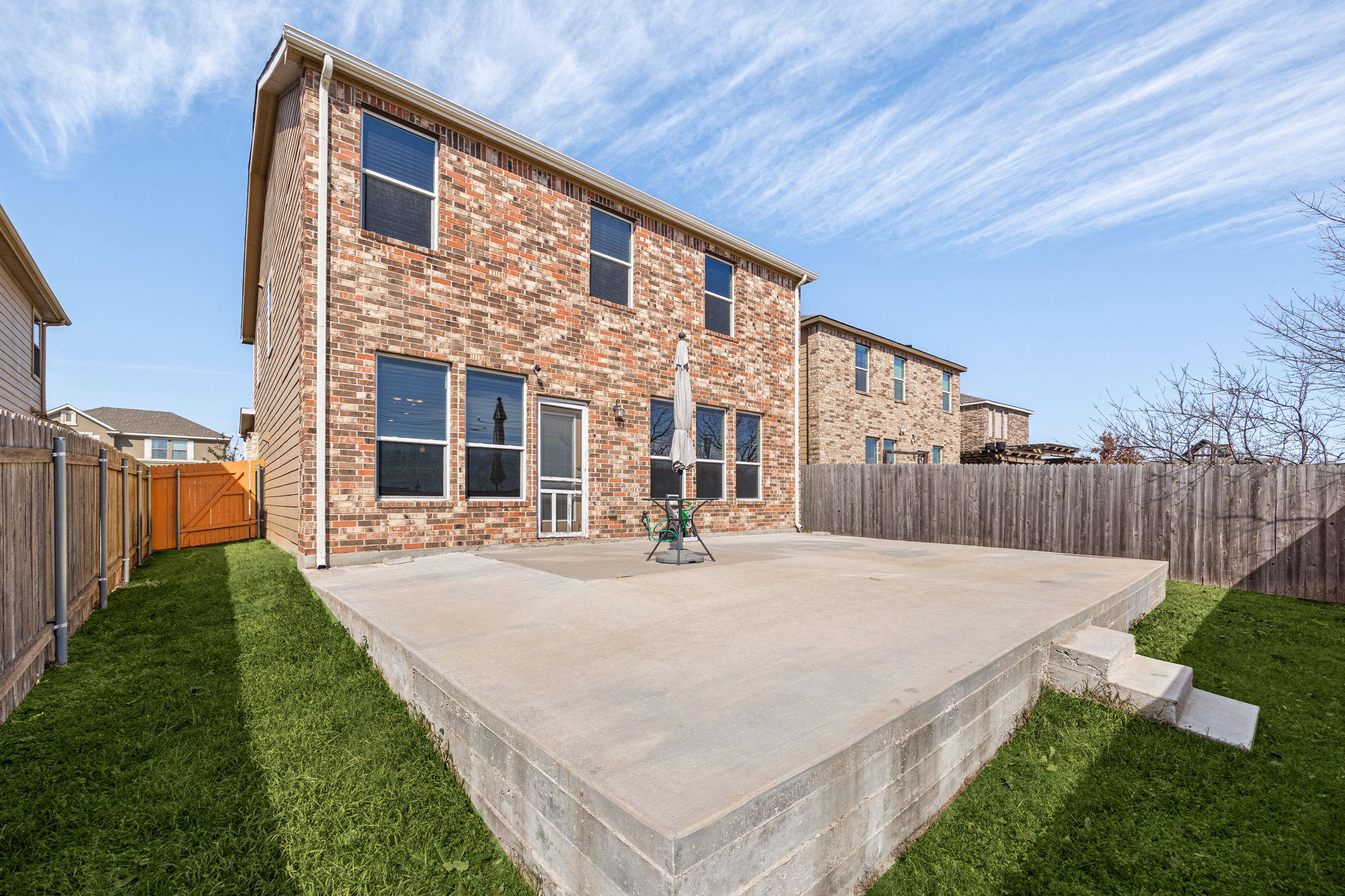 14615 Goshawk Drive Pflugerville, TX 78660 - Photo 27 of 29 a view of an house with backyard and porch