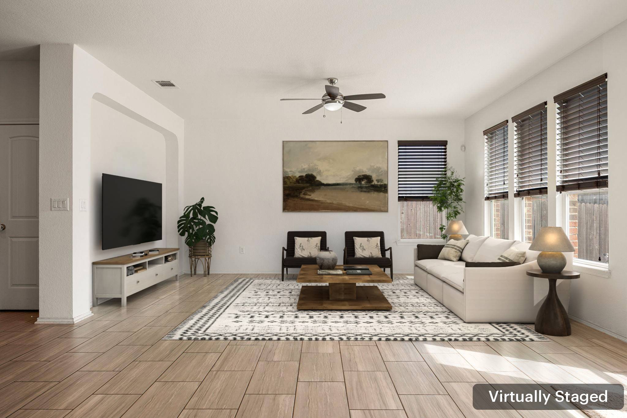 14615 Goshawk Drive Pflugerville, TX 78660 - Photo 4 of 29 a living room with furniture and a flat screen tv