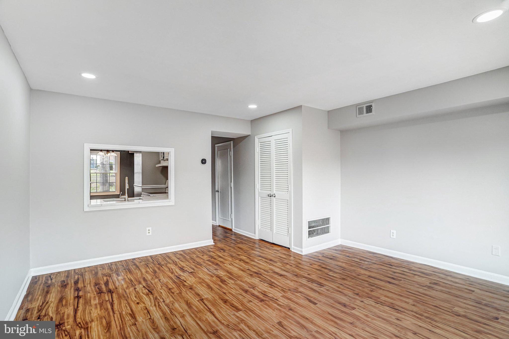 8396 Forrester Boulevard, Unit 555 Springfield, VA 22152 - Photo 9 of 24 a view of an empty room