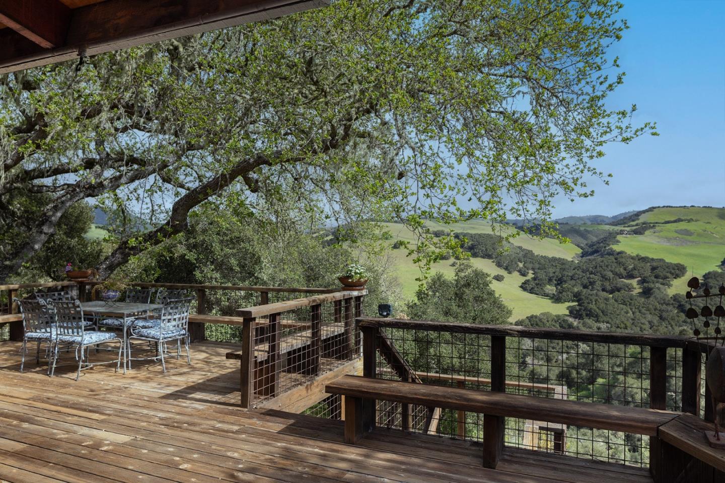 17094 Cachagua Road Carmel Valley, CA 93924 - Photo 13 of 42 a view of a balcony with chairs