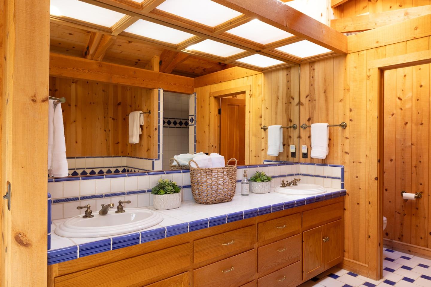 17094 Cachagua Road Carmel Valley, CA 93924 - Photo 18 of 42 a bathroom with a sink and a mirror