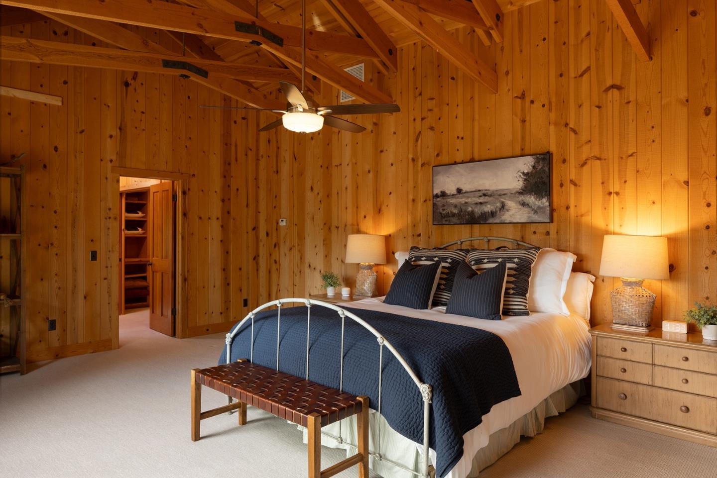 17094 Cachagua Road Carmel Valley, CA 93924 - Photo 19 of 42 a bedroom with a bed and a chair