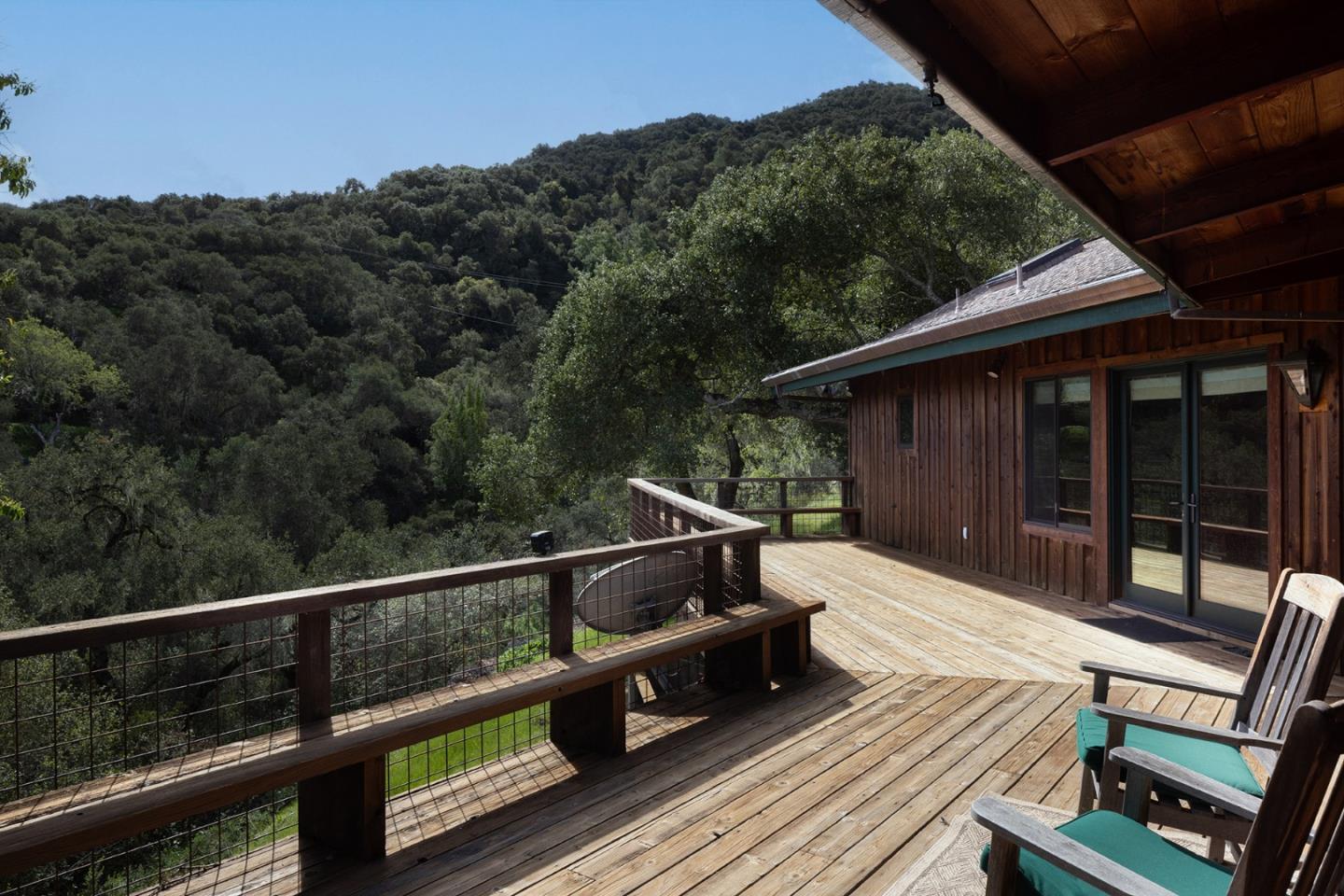17094 Cachagua Road Carmel Valley, CA 93924 - Photo 24 of 42 a roof deck with wooden floor and mountain view