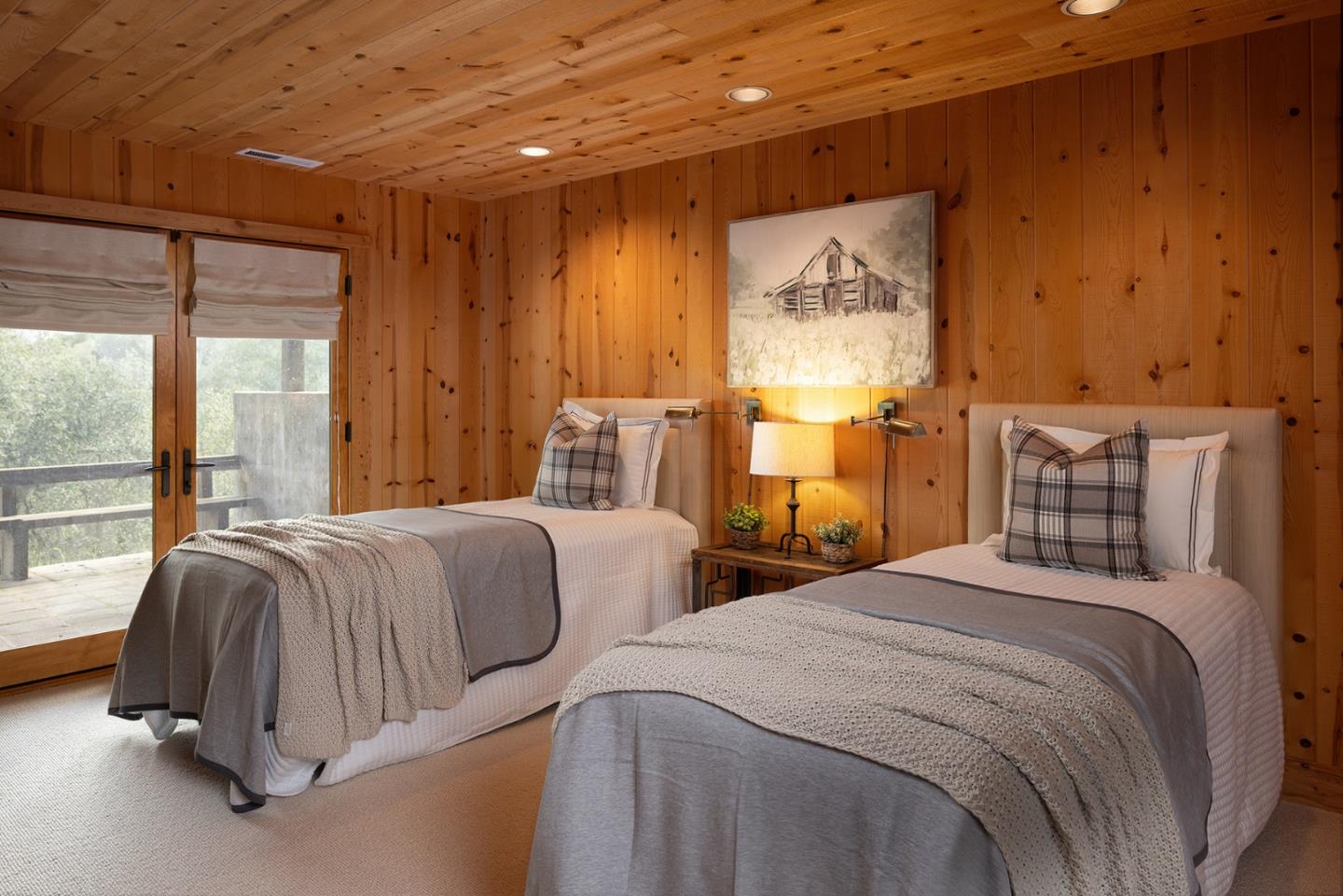 17094 Cachagua Road Carmel Valley, CA 93924 - Photo 29 of 42 a bedroom with two beds and large window