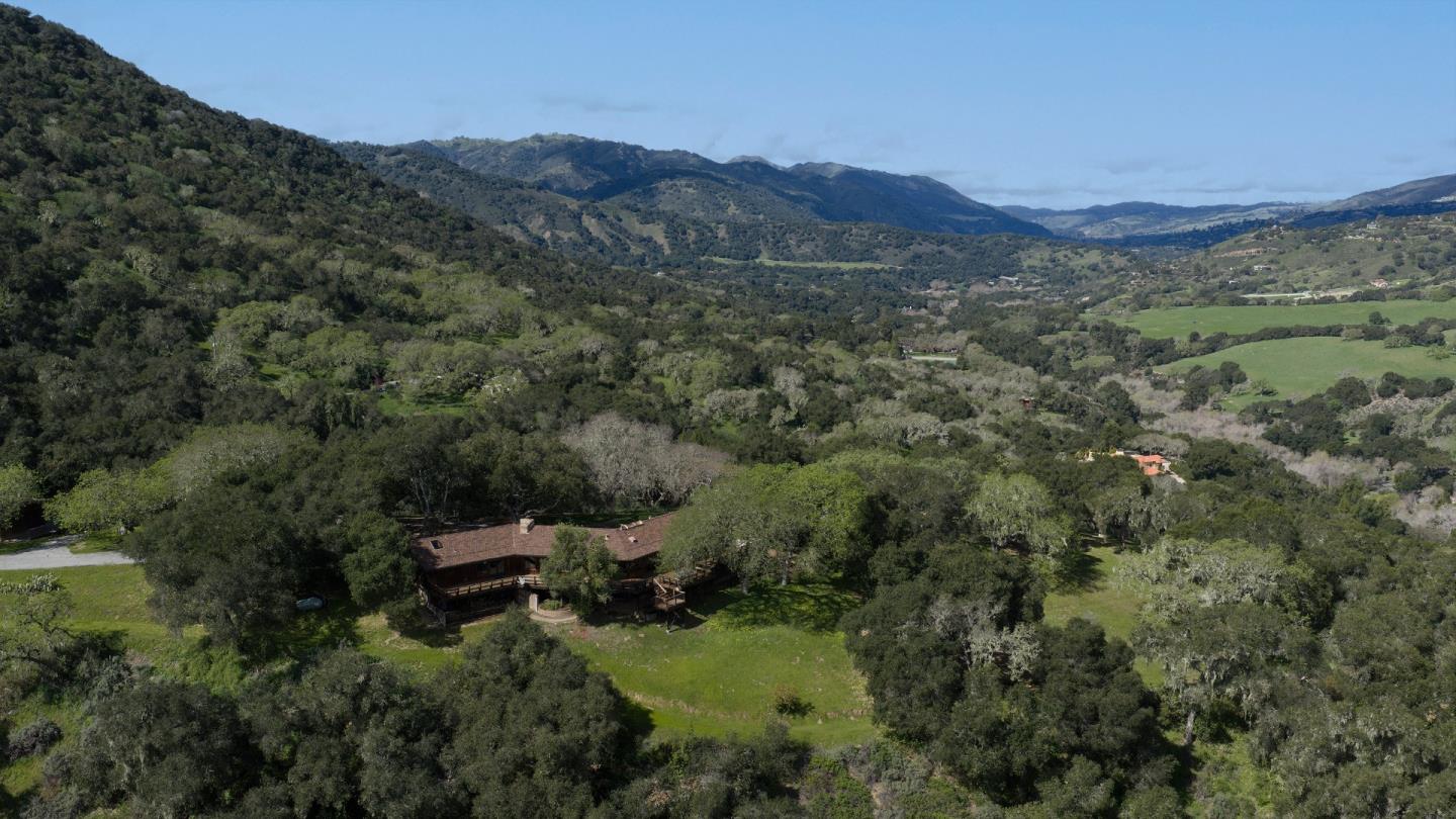 17094 Cachagua Road Carmel Valley, CA 93924 - Photo 42 of 42 a view of a forest with a mountain in the background
