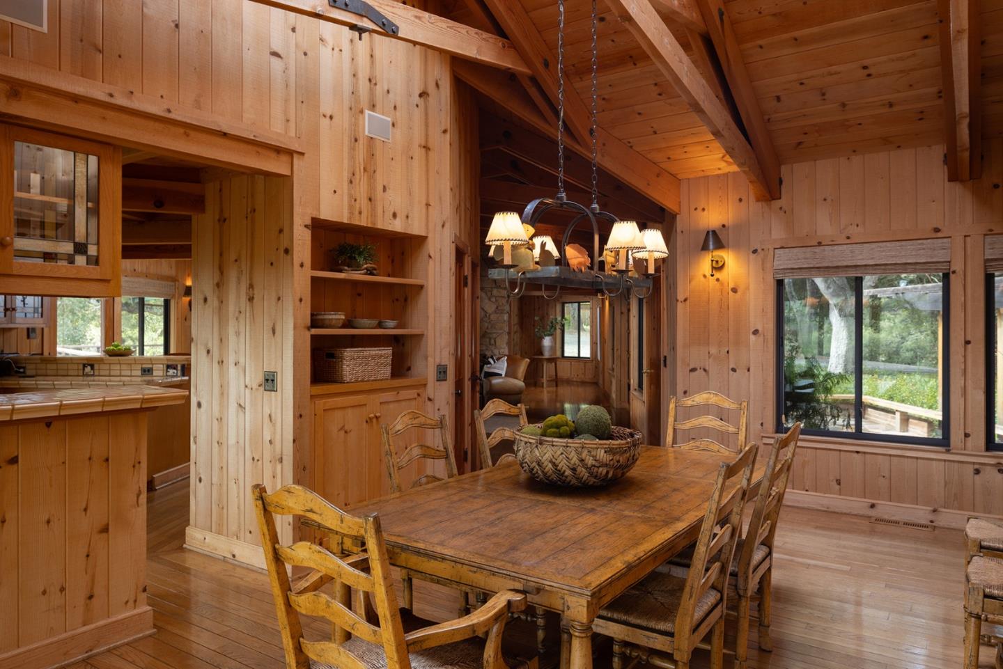17094 Cachagua Road Carmel Valley, CA 93924 - Photo 9 of 42 a view of a dining room with furniture and chandelier