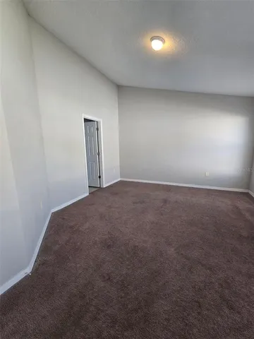 a bathroom with a tub shower and a sink